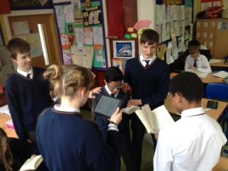 2nd Year Classics students reading Plautus' "The Swaggering Soldier" Photo: Ms. Donohoe
