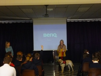 Autism Assistance Dogs Ireland representative talks to Junior Students Photo: 3rd Year student
