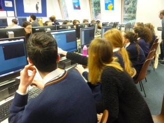 3rd Year DIT Computer Science students from Kevin Street help TY students programme in Python Photo: Ms. O'Kelly
