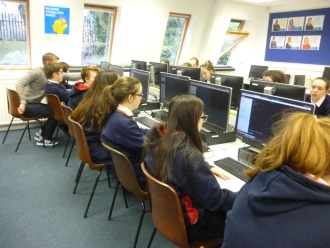 3rd Year DIT Computer Science students from Kevin Street help TY students programme in Python Photo: Ms. O'Kelly
