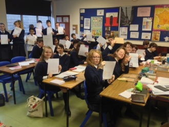 2nd Year French students write to their French penpals Photo: Mr. Priestley
