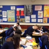 2nd Year French students write to their French penpals Photo: Mr. Priestley
