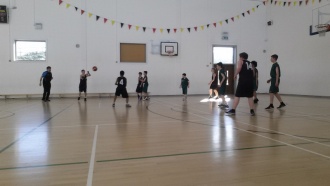 Junior Boys basketball teams versus Coláiste Raithlín Photo: Ms. Finnegan
