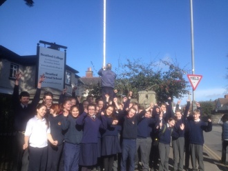 Raising the Green Flag Photo: Christina Greene
