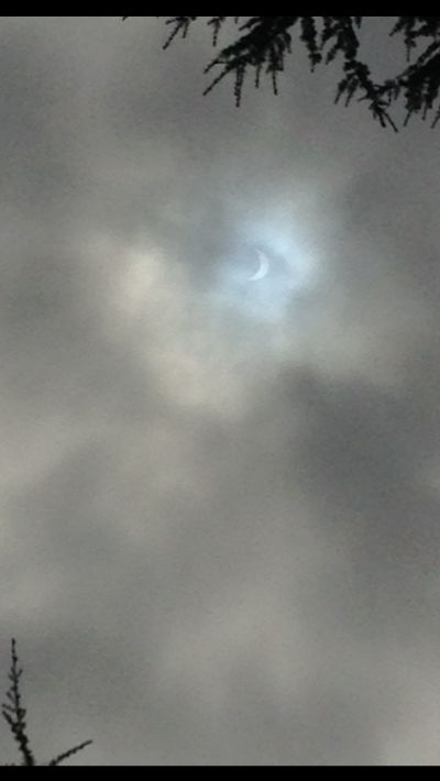 Witnessing the Solar Eclipse ... through clouds
