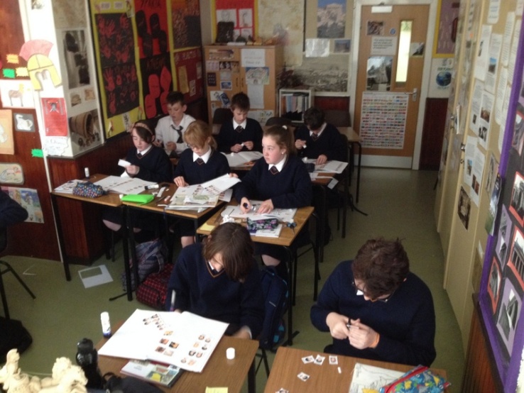 1st years busy cutting out images of monsters and gods. Photo: Ms. Donohoe
1st years busy cutting out images of monsters and gods. Photo: Ms. Donohoe